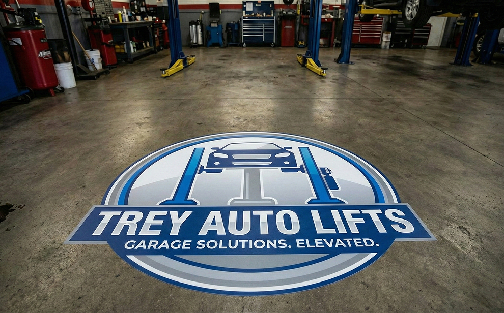 Floor graphic at a mechanic shop—sign specs like size and material matter for accurate quotes